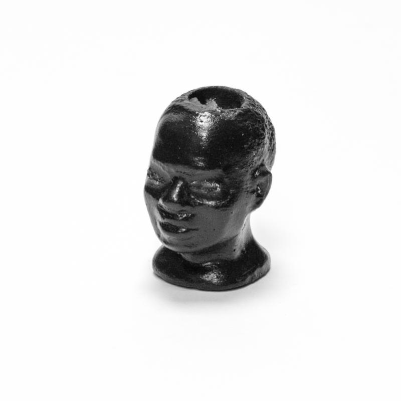 Sant. Eleggua de bolsillo negro Joven (5 x 4 cm Aprox.)